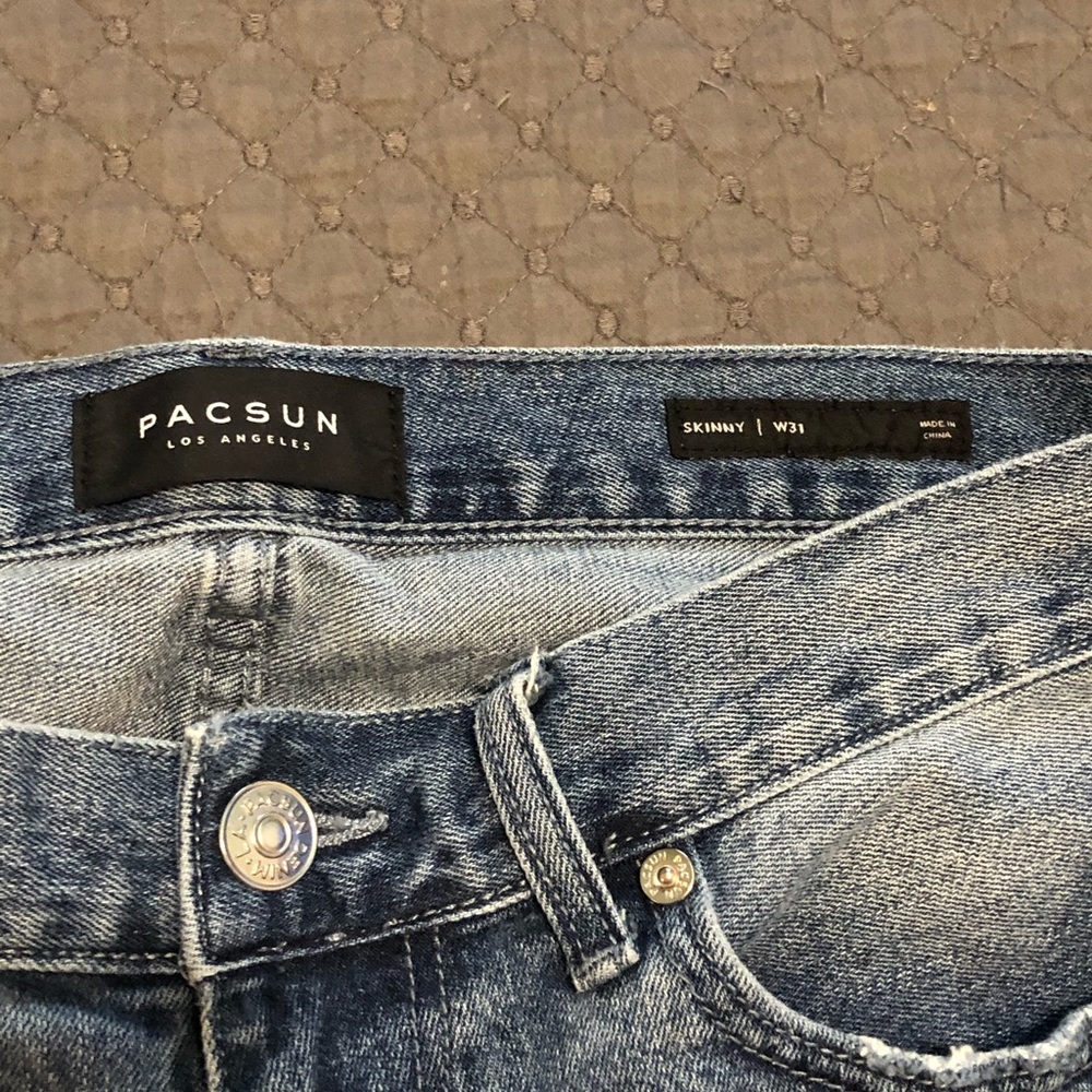 Men's distressed denim shorts